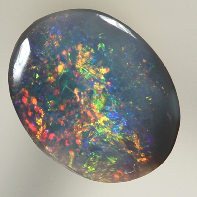 SOLID BLACK OPAL Bright, sparkling red fire dominates